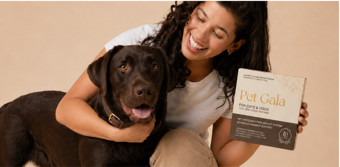 Woman smiling beside a chocolate-brown dog while holding a Pet Gala box